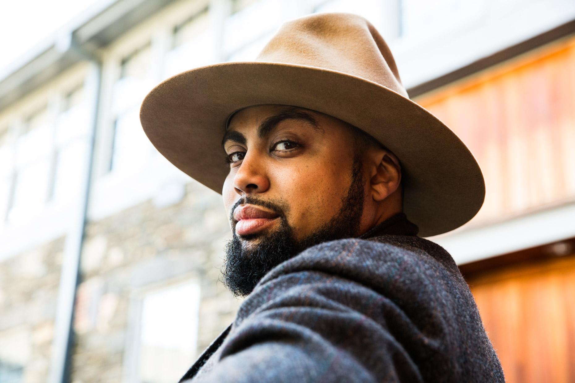 African American Male with beard and brimmed hat