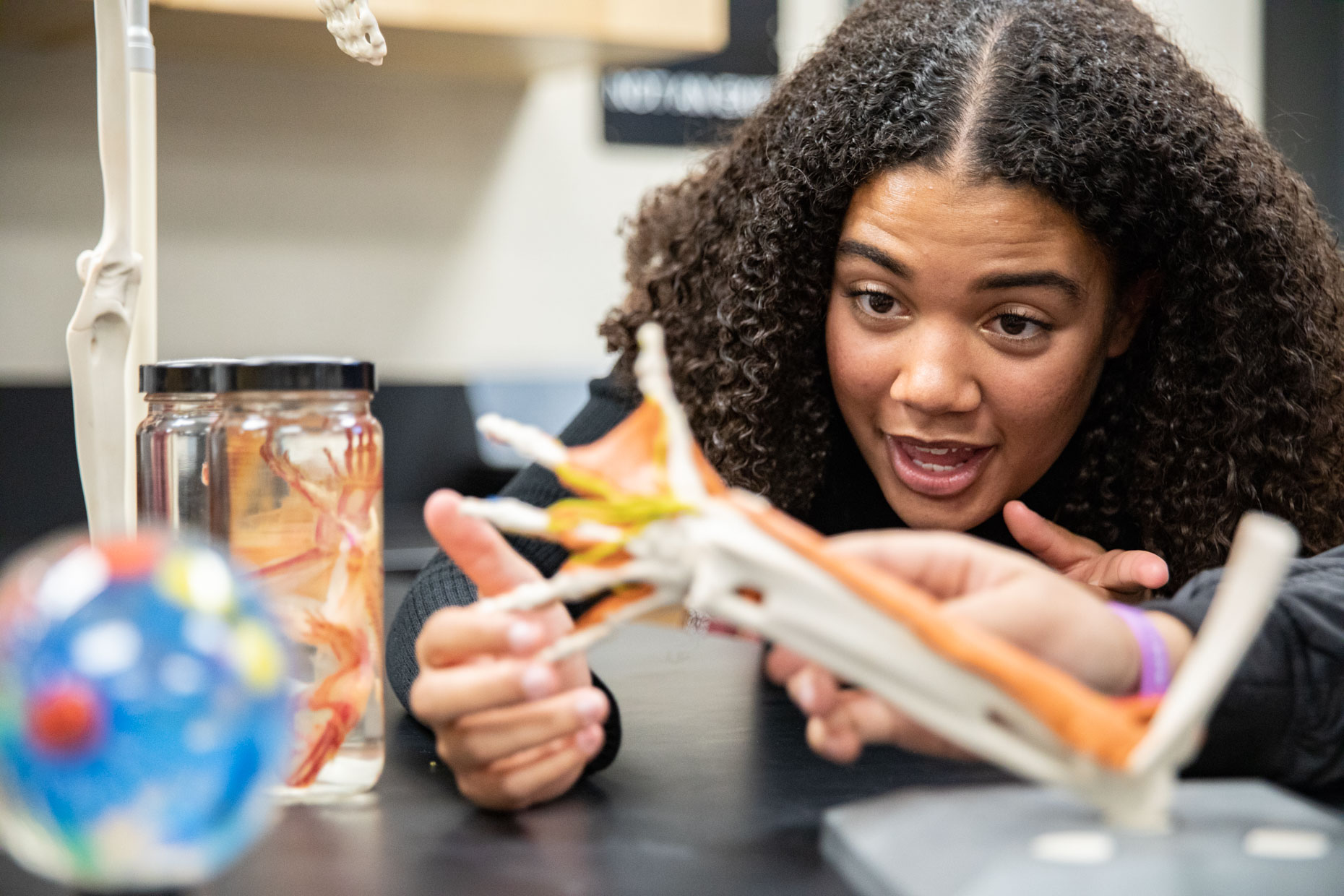 Female African American student in biology lab